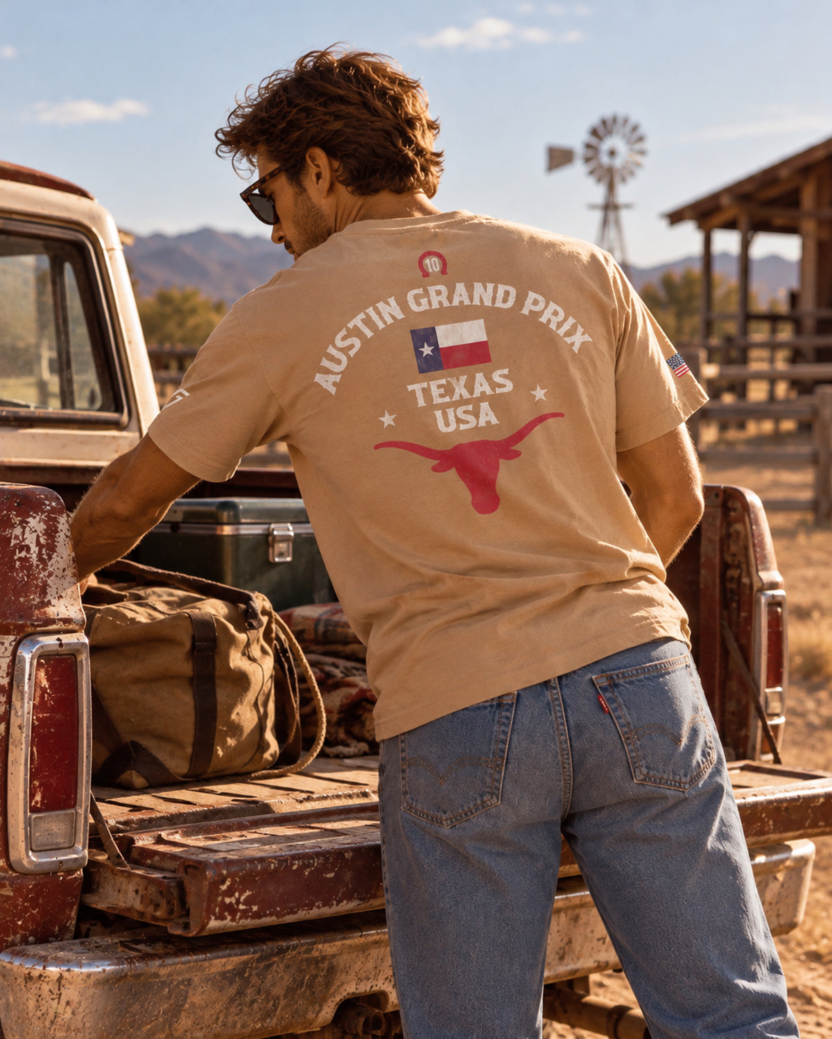 Man wearing the sand Pierre Gasly Austin Tee, back print Austin Grand Prix Texas USA