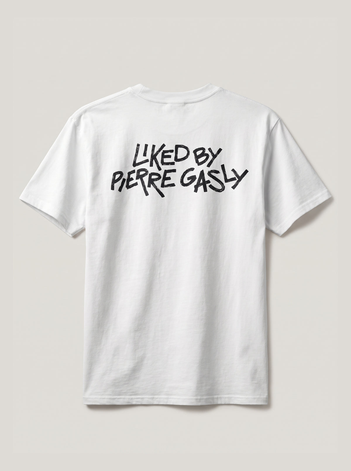 White Liked by Pierre Gasly tee, back view with LIKED BY PIERRE GASLY lettering
