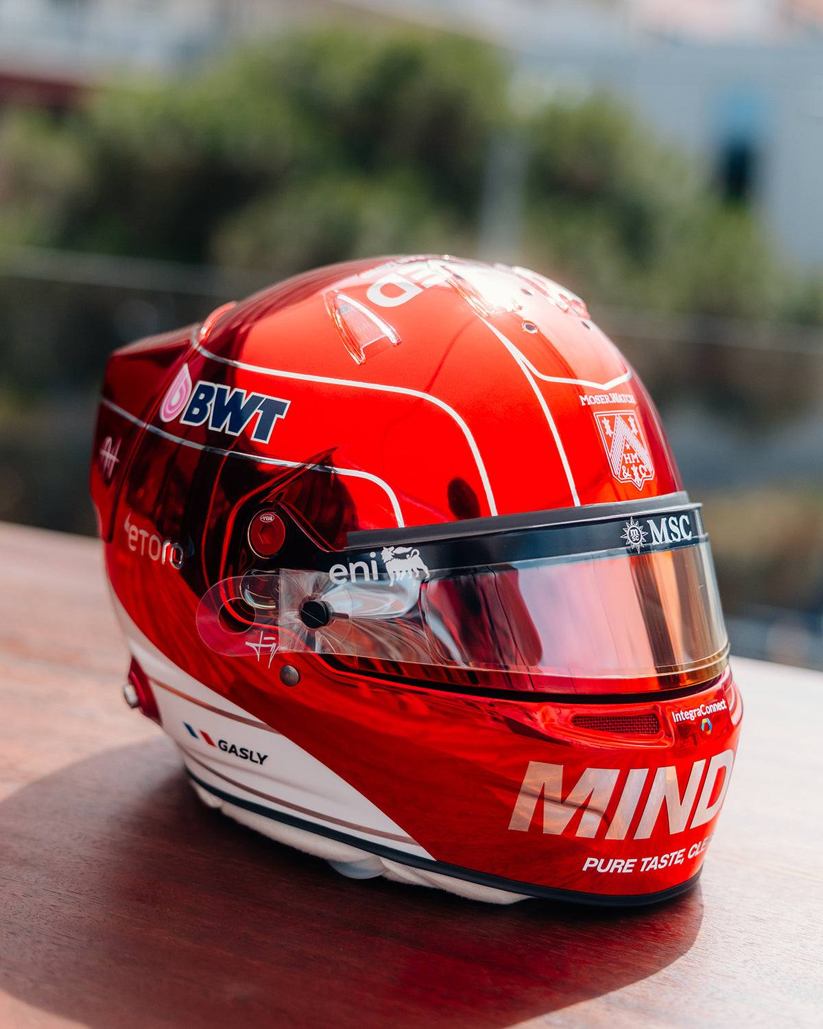 Front view of Pierre Gasly's 2026 Monaco Grand Prix race helmet — MINDED launch livery