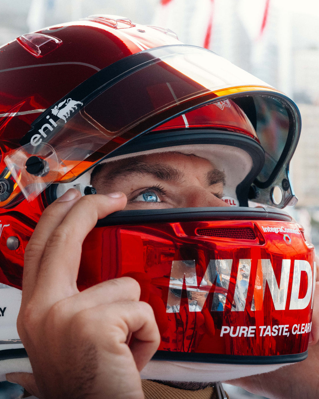 Pierre Gasly wearing his red chrome 2026 Monaco Grand Prix race helmet, MINDED lettering on the chin bar